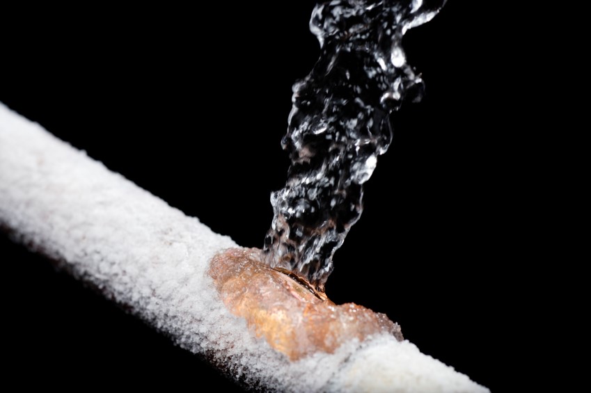 Frozen pipes covered in ice