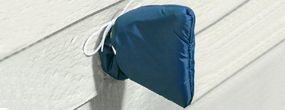 Fall plumbing pipes wrapped with protective tape for insulation and freeze prevention.