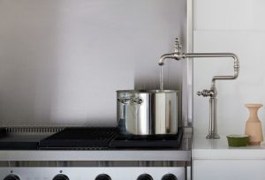 Pot filler faucet over stove for easy cooking water access